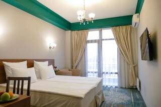 Отель Garuda Boutique Hotel Сухум Стандартный двухместный номер с 1 кроватью или 2 отдельными кроватями-10