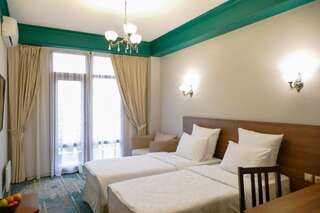 Отель Garuda Boutique Hotel Сухум Стандартный двухместный номер с 1 кроватью или 2 отдельными кроватями-12